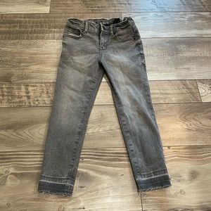 Distressed gray super skinny jeans